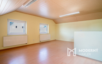 Na predaj rozsiahly investičný pozemok s polyfunkčným domom