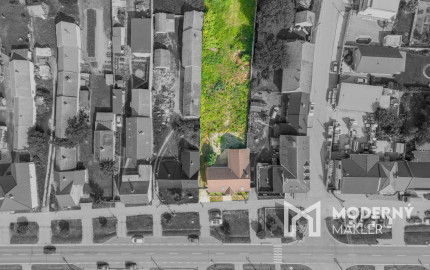 Na predaj rozsiahly investičný pozemok s polyfunkčným domom