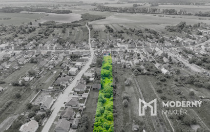 Na predaj rozsiahly investičný pozemok s polyfunkčným domom