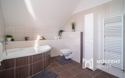 REZERVOVANÉ - Na predaj klimatizovaný 4-izbový rodinný dom s garážou a možnosťou prerobenia na 5-izbový v Senci