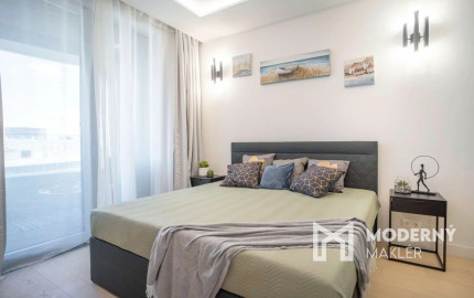 Na prenájom kompletne zariadený 2-izbový byt s garážovým parkovacím státím v SKYPARKU