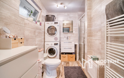 Na predaj priestranný 4-izbový rodinný dom v Malženiciach