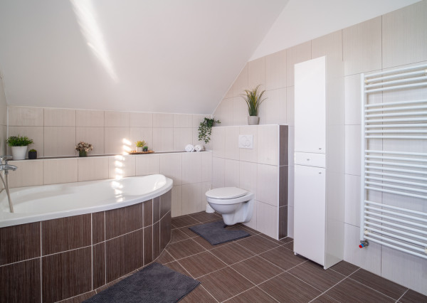 REZERVOVANÉ - Na predaj klimatizovaný 4-izbový rodinný dom s garážou a možnosťou prerobenia na 5-izbový v Senci