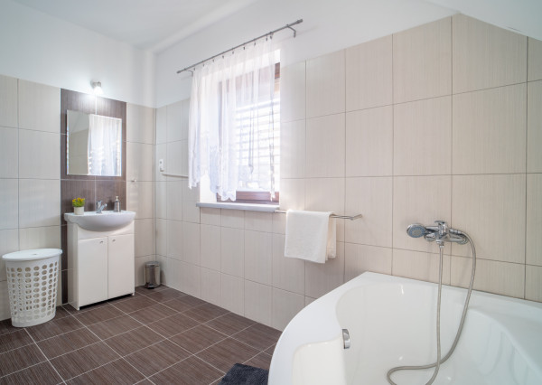 REZERVOVANÉ - Na predaj klimatizovaný 4-izbový rodinný dom s garážou a možnosťou prerobenia na 5-izbový v Senci