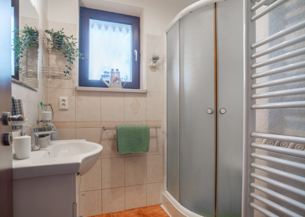 REZERVOVANÉ - Na predaj klimatizovaný 4-izbový rodinný dom s garážou a možnosťou prerobenia na 5-izbový v Senci