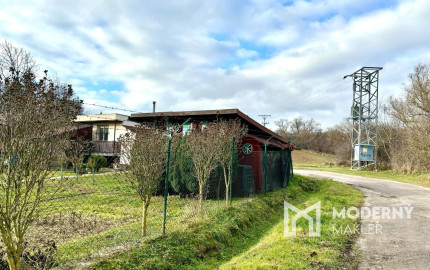 Exkluzívne na predaj  záhrada s chatkou v Bánovciach n/B