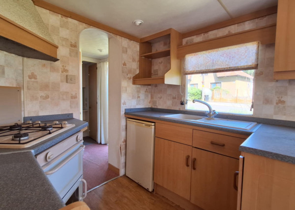 HORNÉ DRŽKOVCE – Mobilný dom s pozemkom pri potoku (790 m²)